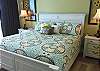 The Gulf Front Bedroom offers King Bedding, Bedside Tables with Lamps and spectacular views of the Gulf of Mexico