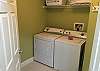 The laundry room offers a full size washer and dryer for convenience