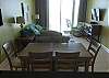 The dining area offers a table with seating for 6