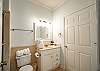 The guest bathroom features a single vanity, tub/shower combo, and is fully stocked with linens for your stay.