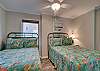 Bedroom 3 offers 2 full size beds and a private bathroom