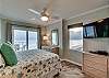 Enjoy endless views of the Gulf of Mexico from every angle in this beautifully decorated master bedroom.