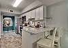 The kitchen also features an eat in bar with seating for 2. 