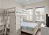 Guest bedroom 2 features a twin over full bunk bed with plenty of storage for your personal belongings.