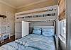 Guest Bedroom 2 offers twin over full bunk beds and plenty of storage.