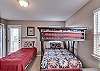 Bedroom 2, or Kids Room, offers Full over Full Bunk Beds, a Twin Bed, & 37
