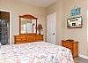This guest bedroom is featured at the front of the home and is more separate from the rest of the bedrooms. This bedroom is perfect for the early risers who do not want to disturb the rest of the group. It also includes a private bathroom for convenience.