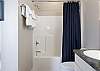 No need to worry about privacy in this spacious suite included in the primary bedroom.