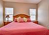 King bedding is offered in bedroom 3, and also features a private bathroom for convenience.