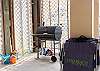 A charcoal grill is featured under the house for you to enjoy during your stay.