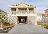Welcome to Sandy Toes, located at 436 Harbor Light Circle. This 4 bedroom, 4 and a half bathroom is located in a community that offers beach access, a communal pool, and tennis court.