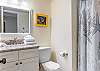 Refresh and rejuvenate in your private oasis—complete with a sleek standing shower, single vanity, and fully stocked linens for a stay that feels like pure indulgence.