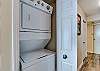 Unit 1904 offers a stack washer/dryer that is conveniently located in a closet in the kitchen.