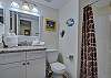 Bathroom 2 offers a single vanity, standing shower, and is fully stocked with linens for your stay.