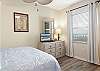 The guest bedroom offers plush queen bedding, a private bathroom, and thoughtfully selected furnishings to make your stay truly unforgettable.