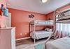 Bedroom 2 offers a twin over twin bunk bed, and a twin over full bunk bed making this room capable of sleeping 5.