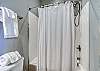The roomy private bathroom offers a tub/shower combo and is fully stocked with linens for your stay!