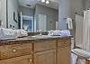 The private bathroom offers a single vanity, tub/shower combo and is fully stocked with linens for your stay!