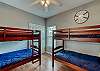 This bedroom offers 2 sets of twin over twin bunk beds and a large closet for storing personal items out of the way
