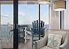 Enjoy Endless views of the Gulf from the spacious living area, or go through the sliding doors for a front row seat!