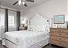The primary bedroom features king bedding and is beautifully furnished to make you feel right at home.
