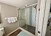 Step into your private bathroom and experience the ultimate relaxation with a stunning tiled shower. Each bathroom is fully stocked with linens for your stay.