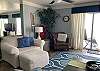 The open living area features Gulf front views and plenty of comfortable seating to relax and unwind after a day on the beach.