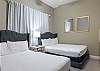 Bedroom 2 features a pair of Queen beds and is capable of sleeping 4 adults comfortably.