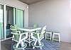 Enjoy your meals or morning coffee at the table with seating for 4. Additional seats are offered for extra guests.