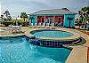 The main pool featured at Rookery III offers a small clubhouse with restrooms and plenty of seating for enjoying a relaxing day lounging in the sun.