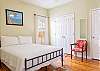 Bedroom 2 features king bedding and a spacious closet for storing your personal belongings out of sight.