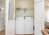A spacious laundry closet, featuring a full size washer and dryer, is offered for use during your stay.