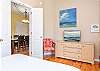 Bedroom 3 features a dresser for storing your personal belongings and also a television to enjoy in your down time.