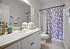 The private bathroom offers a tub/shower combo, single vanity and is fully stocked with linens for your stay.