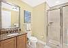 Bathroom 4 features a shower, single vanity, and is fully stocked with linens for your stay.