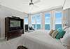 The south facing primary suite offers endless views of the Gulf of Mexico, and features king bedding.