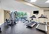 A fitness room is featured on site and offers plenty of equipment for a great workout.