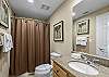 A guest bathroom is provided and offers a tub/shower combo, single vanity, and is fully stocked with linens for your stay.