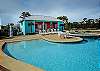 The main pool in the complex features a small clubhouse and kiddie pool. Perfect for enjoying a relaxing day in the sun.