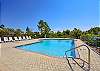 The Rookery III features 2 pools for enjoyment during your stay. This pool is located nearest this unit and features loungers for spending time in the sun.