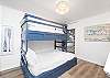 The large guest bedroom features a twin/full bunk bed and is capable of sleeping 3.