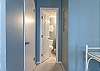 A spacious closet and full bathroom are included in the primary bedroom for convenience and privacy.