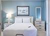 The primary bedroom features Queen bedding, and plenty of storage for your personal belongings.