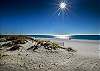 The sand and surf are located just a short 430 foot walk across the street from Lani Kai complex