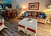 Cozy living area includes a sofa sleeper and additional seating for extra guests