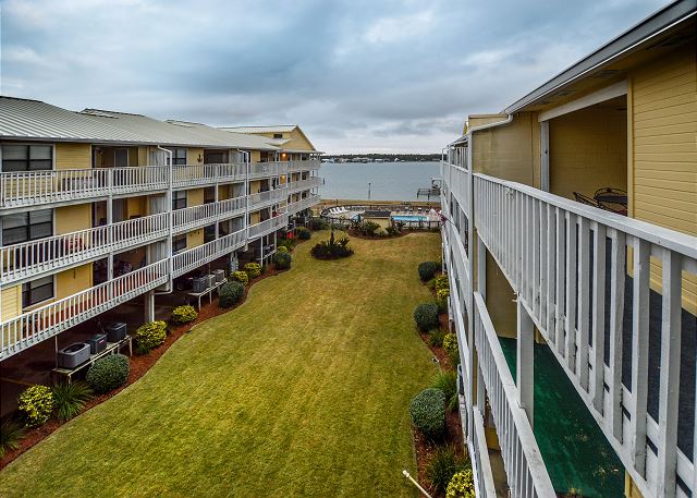 Enjoy sunrises and sunsets from this awesome 3rd floor balcony overlooking Little Lagoon.