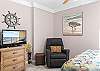 This guest bedroom features Queen bedding and is comfortably furnished to make you feel right at home.