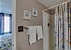 Bathroom 2 offers a standing shower, and is fully stocked with linens for your stay.