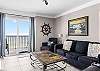 The living area of this 3 bedroom unit offers comfortable seating for relaxing and unwinding after a long day on the beach. The views are endless from this space as well. Step onto the balcony for a front row seat to the perfect sunrise and sunset!