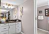 The spacious private bathroom features a double vanity which is separate from the shower and toilet for convenience of groups getting dressed for dinner plans or a night out.